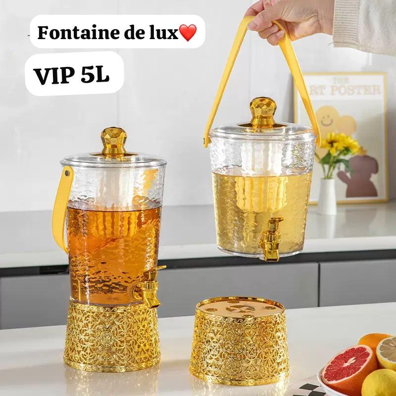 Fontaine en plastique jus où boisson doré et blanc